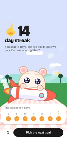 A 14-day streak celebration: the pet rides a rocket over the picnic.
